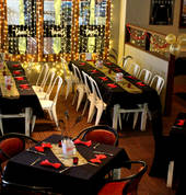 "A Night at the Oscars" private function dinner tables set up in bar