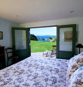 downstairs bedroom opening out to lawn,private bathroom .twin or superking beds