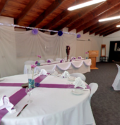 Purple wedding reception in Kia Ora Room